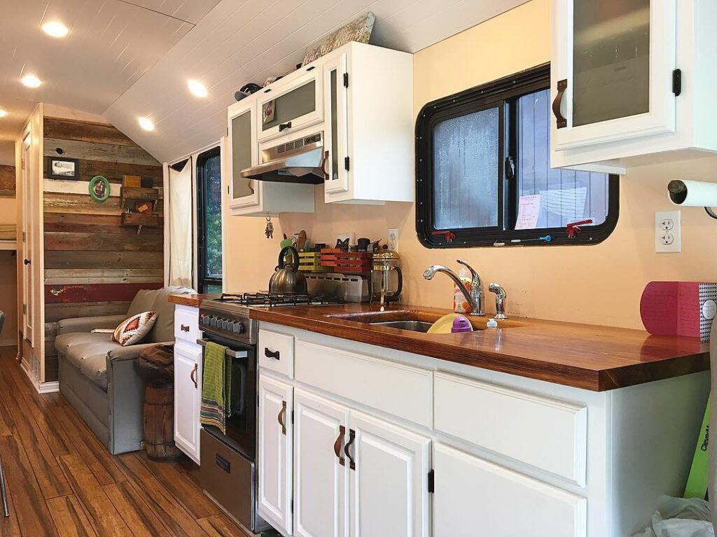 0048 Peek inside this converted bus Its unique kitchen will charm you with its efficiency smallhometours.com 4