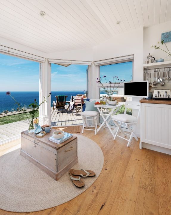 0064 Take a look at the luxurious interior of this cliffside cottage smallhometours.com 3