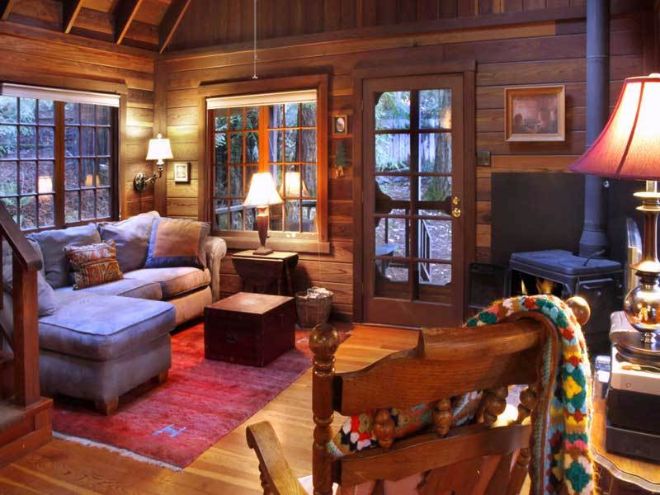 0077 Meet Dreamcatcher — the rustic forest cabin with a surprise on the back patio smallhometours.com 3