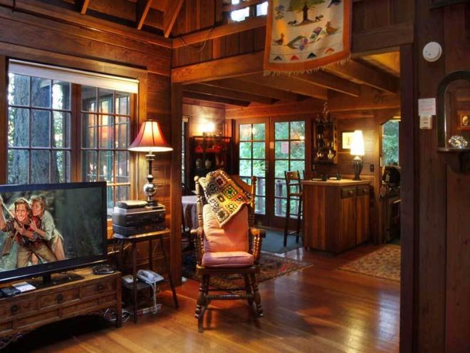 0077 Meet Dreamcatcher — the rustic forest cabin with a surprise on the back patio smallhometours.com 5