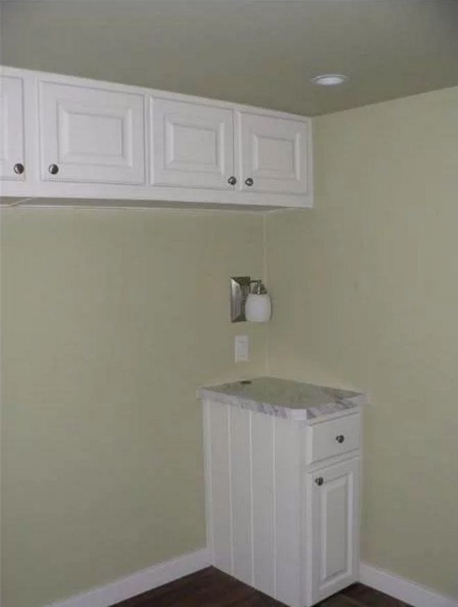 0080 Fall in love with the clean lines of this park model and its many storage options smallhometours.com 6