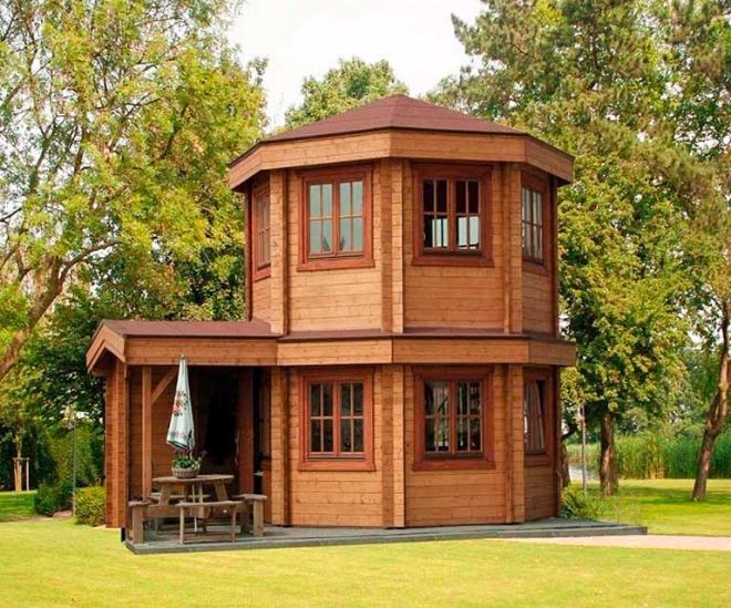 0082 Explore this 272 square foot log cabin and its unique octagonal pavilion design smallhometours.com 2
