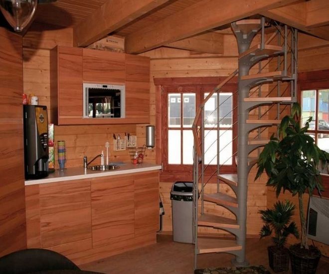0082 Explore this 272 square foot log cabin and its unique octagonal pavilion design smallhometours.com 3