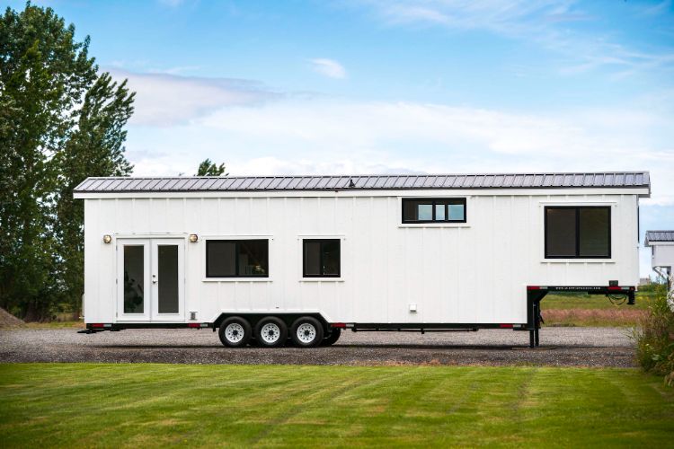 0086 Dont underestimate this tiny home It features 3 bedrooms and can fit 6 to 8 people smallhometours.com 2
