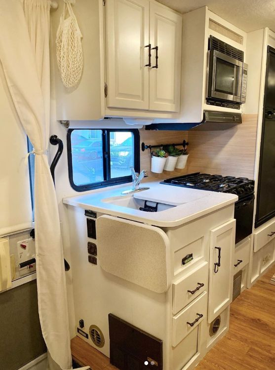 0100 Lady renovated this camper made it her full time home. Take a look inside smallhometours.com 5