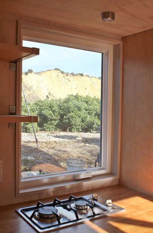 0112 Tour this spacious luxury tiny home on wheels with high ceilings and 2 offices 4