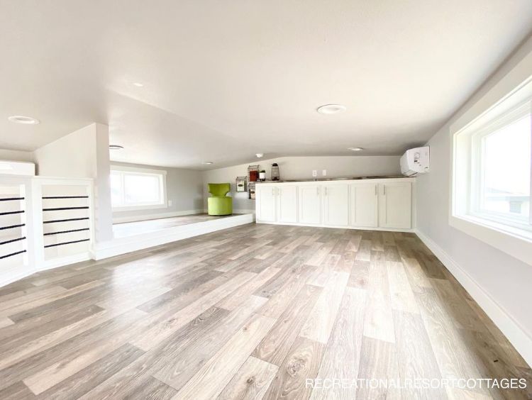 0118 Step inside this farmhouse style tiny home with an interior so luxurious youll forget youre in a RV 10