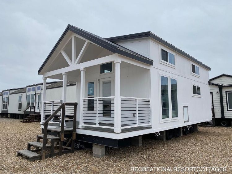 0118 Step inside this farmhouse style tiny home with an interior so luxurious youll forget youre in a RV 2