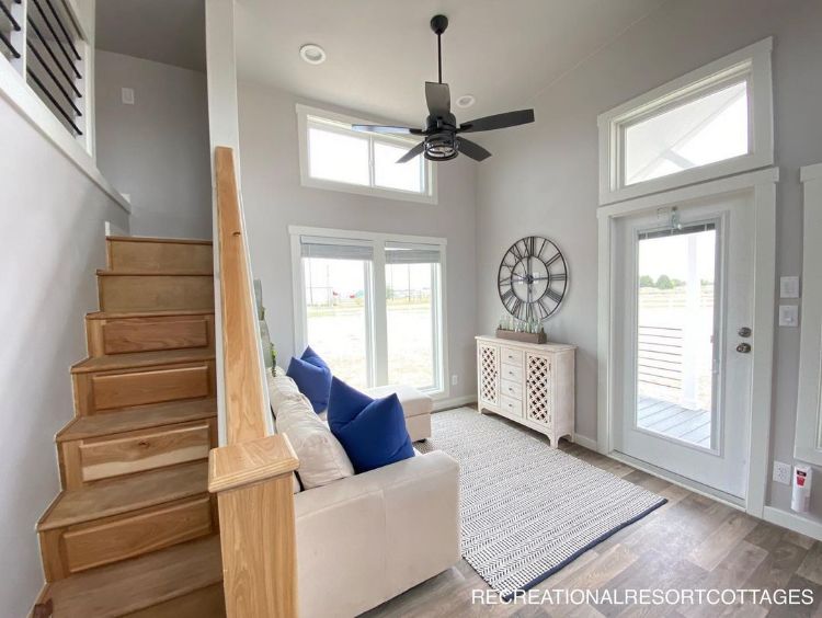 0118 Step inside this farmhouse style tiny home with an interior so luxurious youll forget youre in a RV 9