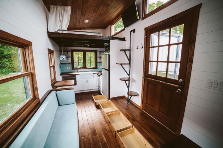 0126 Step through this stunning Dutch door to take a peek inside this tiny home smallhometours.com 3