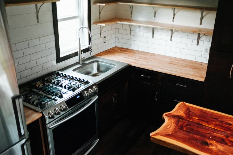 0128 Modern metal siding leads to industrial interiors in this contemporary tiny home smallhometours.com 4