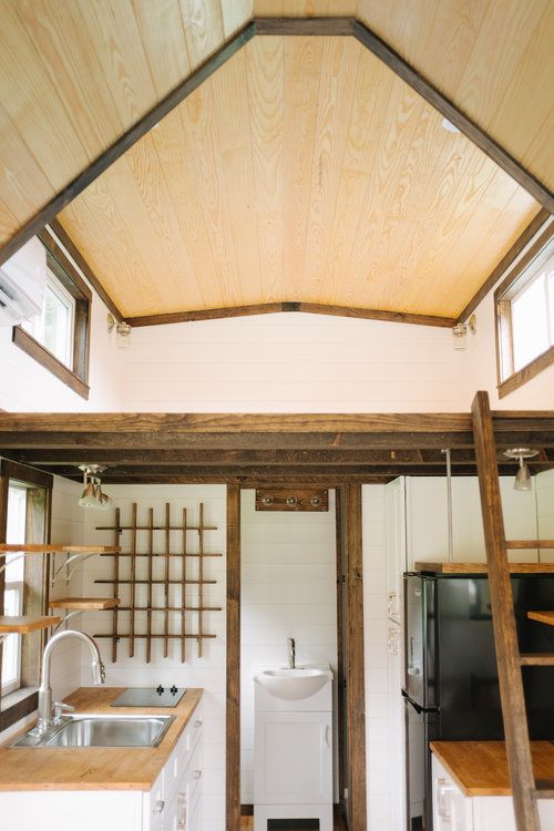 0130 Rustic style with a modern twist creates a bucolic oasis in this Maine inspired tiny home smallhometours.com 5