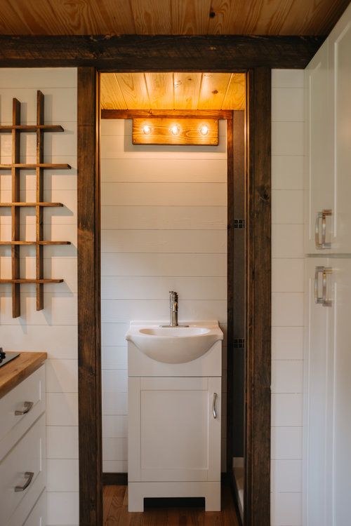 0130 Rustic style with a modern twist creates a bucolic oasis in this Maine inspired tiny home smallhometours.com 6