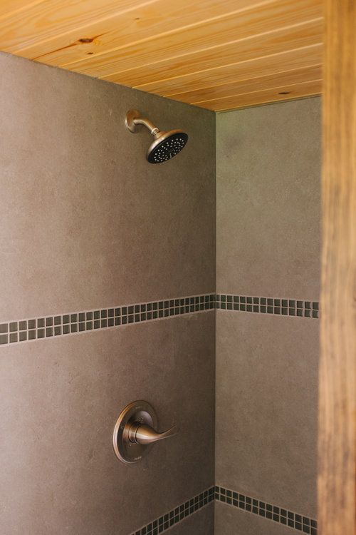 0130 Rustic style with a modern twist creates a bucolic oasis in this Maine inspired tiny home smallhometours.com 7