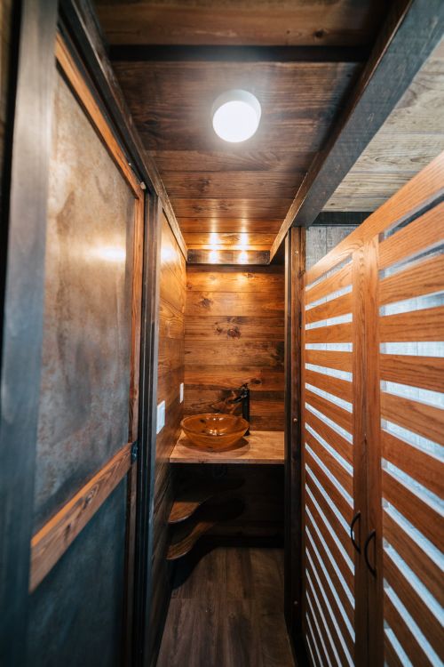 0131 Form meets function in this 26 foot tiny home complete with its own Crossfit gym smallhometours.com 11