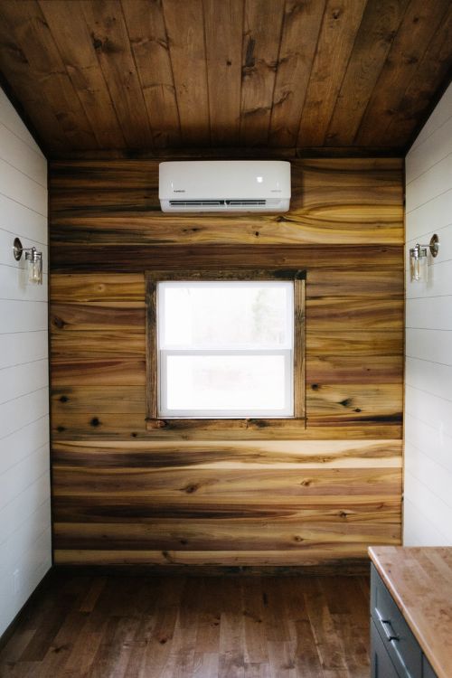 0133 Warm wooden accents and hand hewn details create farmhouse style in 330 square feet smallhometours.com 6
