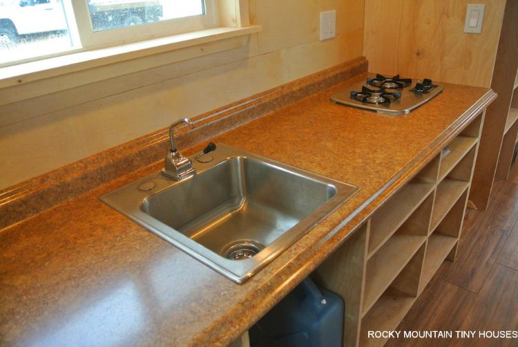 0136 How Rocky Mountain Tiny Houses created this off the grid home on a bare bones budget smallhometours.com 5