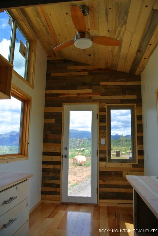 0137 This 18 foot tiny home was specially designed to let in light and views smallhometours.com 3