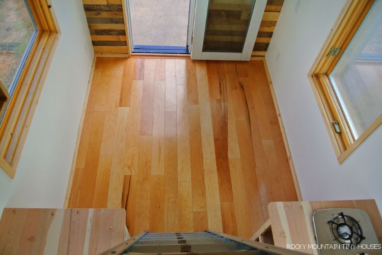 0137 This 18 foot tiny home was specially designed to let in light and views smallhometours.com 6