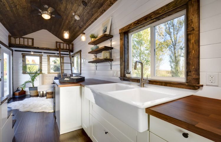 0140 White walls and cedar accents create a luxurious shell in this 26 foot tiny home smallhometours.com 4