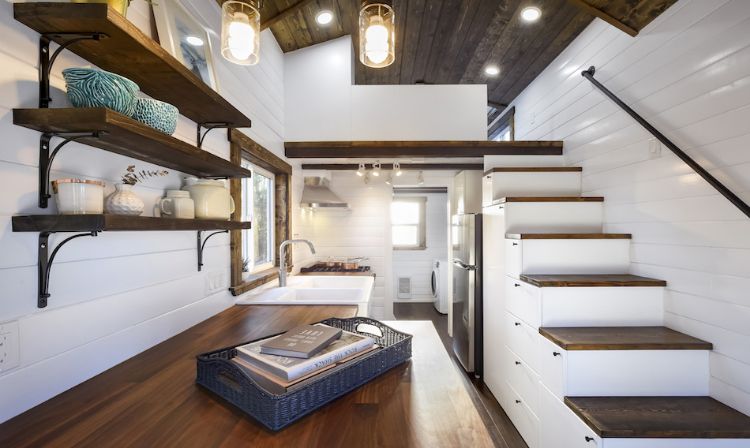 0140 White walls and cedar accents create a luxurious shell in this 26 foot tiny home smallhometours.com 6