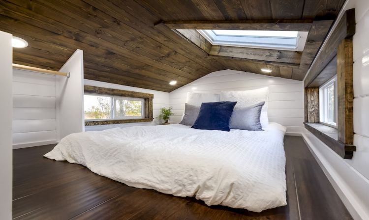 0140 White walls and cedar accents create a luxurious shell in this 26 foot tiny home smallhometours.com 7