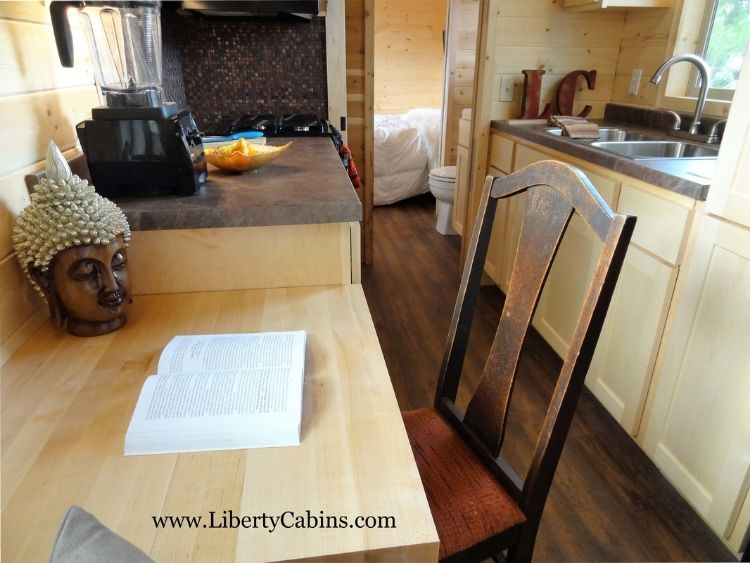 0153 Alpine vibes define this luxurious cabin packaged in an off the grid RV smallhometours.com 3