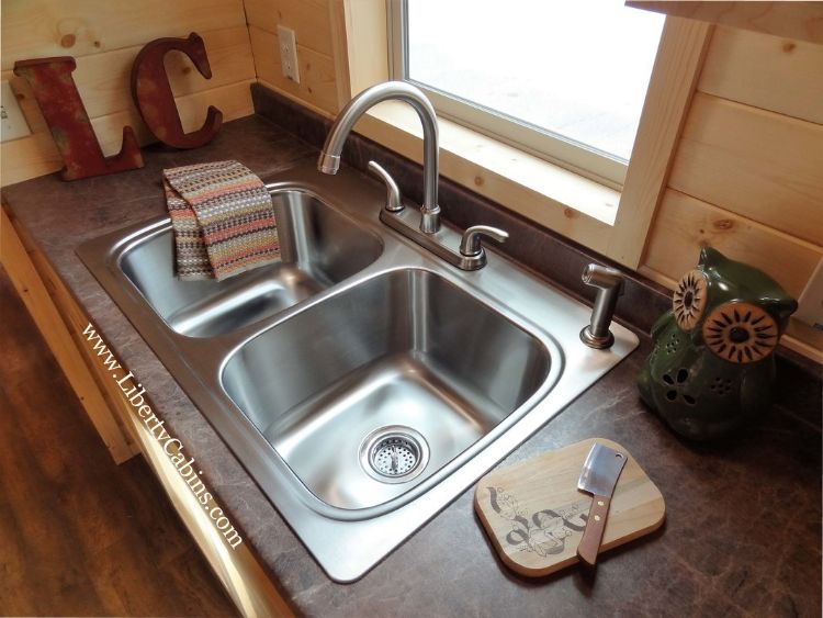 0153 Alpine vibes define this luxurious cabin packaged in an off the grid RV smallhometours.com 5