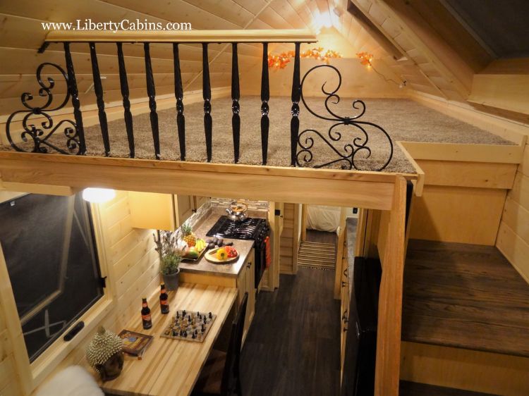 0153 Alpine vibes define this luxurious cabin packaged in an off the grid RV smallhometours.com 7