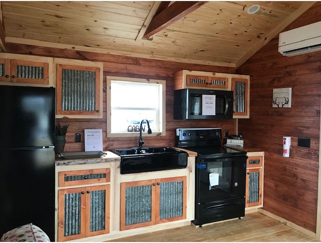0155 Step inside this tiny log cabin on wheels smallhometours.com 4
