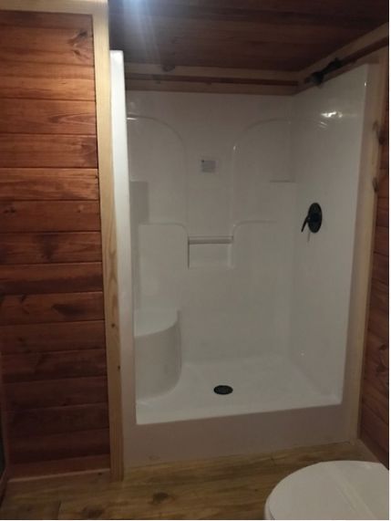 0155 Step inside this tiny log cabin on wheels smallhometours.com 6