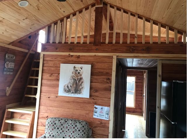 0155 Step inside this tiny log cabin on wheels smallhometours.com 7