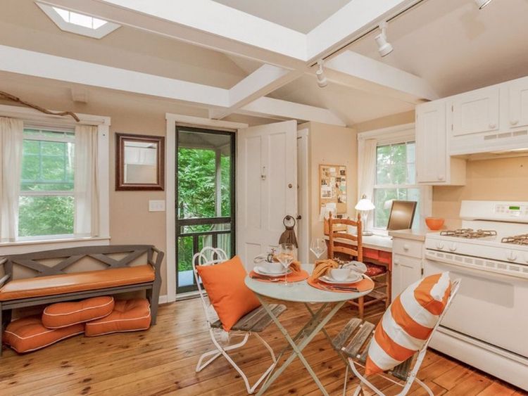 0163 Peek inside this tiny cottage youll love the rustic hardwood floors smallhometours.com 2