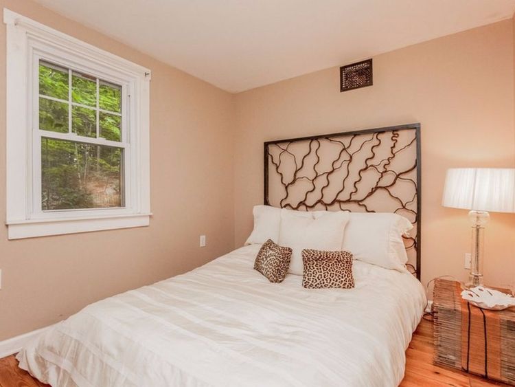 0163 Peek inside this tiny cottage youll love the rustic hardwood floors smallhometours.com 6
