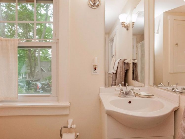 0163 Peek inside this tiny cottage youll love the rustic hardwood floors smallhometours.com 7