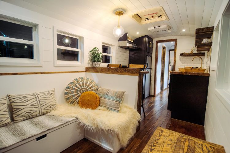 0166 A 12 inch roof raise elevates this luxurious custom Skoolie literally smallhometours.com 2