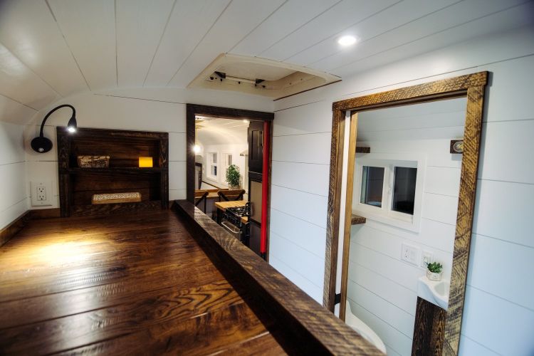 0166 A 12 inch roof raise elevates this luxurious custom Skoolie literally smallhometours.com 5