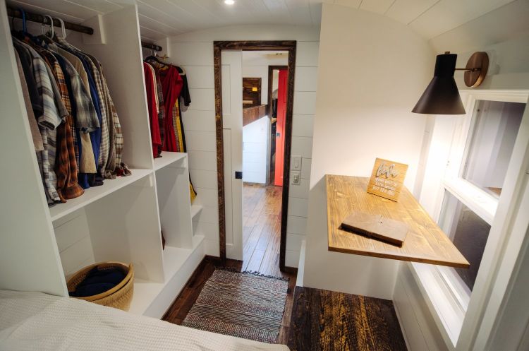0166 A 12 inch roof raise elevates this luxurious custom Skoolie literally smallhometours.com 7