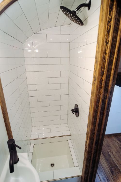 0166 A 12 inch roof raise elevates this luxurious custom Skoolie literally smallhometours.com 8