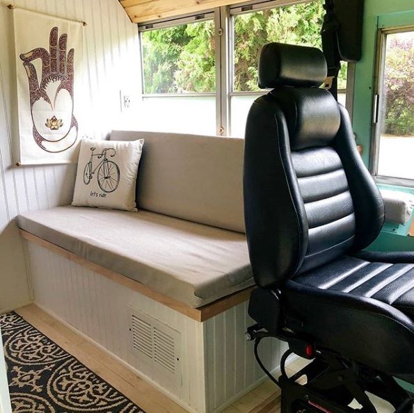 0168 This couple lives full time in a renovated Skoolie with their large family of fur babies smallhometours.com 3