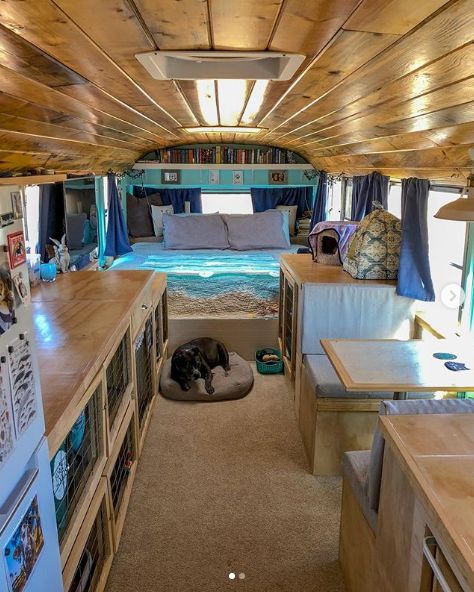 0168 This couple lives full time in a renovated Skoolie with their large family of fur babies smallhometours.com 5