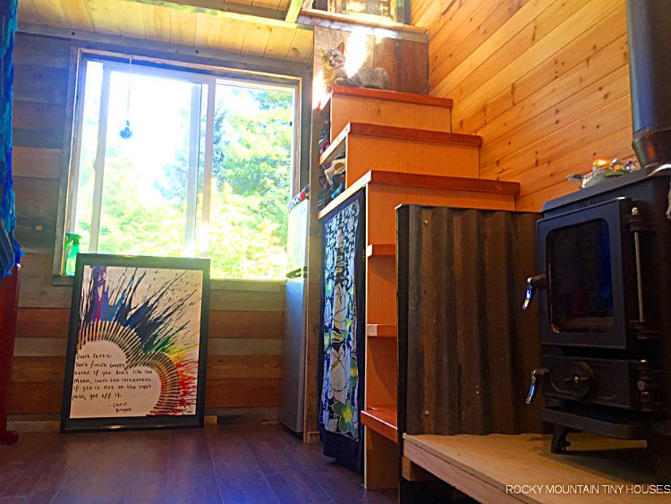 0179 The Dutch door on the Mac Shack is a charming feature of this rustic home smallhometours.com 2