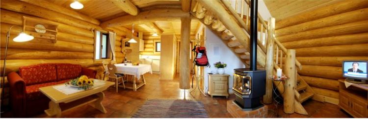 0182 Three log cabins crafted in British Columbia offer cozy respite in Rasen Italy smallhometours.com 3