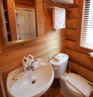 0182 Three log cabins crafted in British Columbia offer cozy respite in Rasen Italy smallhometours.com 4