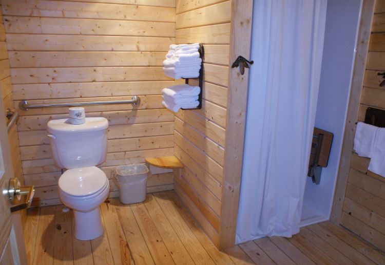 0186 Peek inside The interior of this simple log cabin is perfection smallhometours.com 6