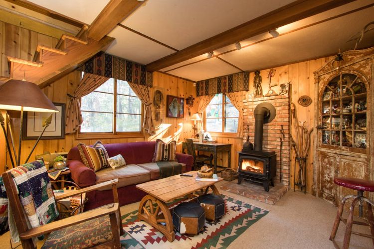 0194 Tour a unique log cabin – youll fall in love the impressive master suite within smallhometours.com 3