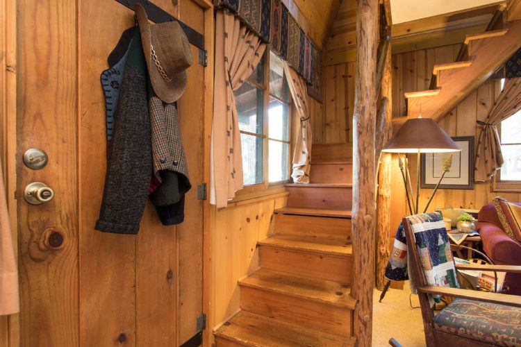 0194 Tour a unique log cabin – youll fall in love the impressive master suite within smallhometours.com 8