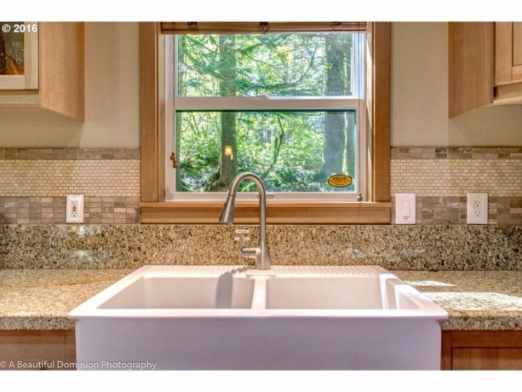 0195 Check out the winning kitchen inside this lovely woodland log home smallhometours.com 6