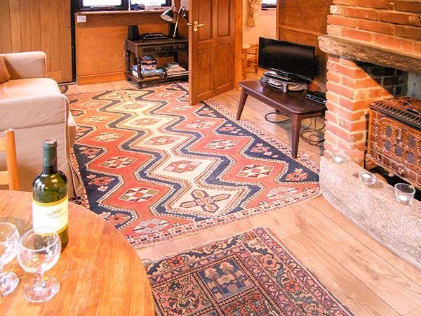 0197 Explore this cozy cabin – youll love the old fashioned fireplace smallhometours.com 3