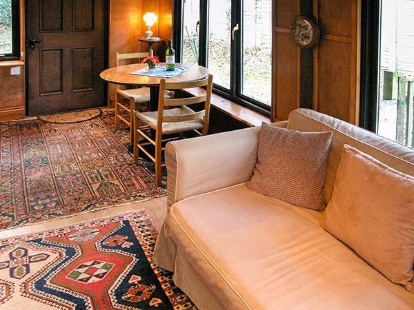 0197 Explore this cozy cabin – youll love the old fashioned fireplace smallhometours.com 4